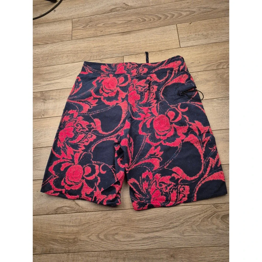 Patagonia Mens 32 Board Shorts Navy Pink Floral Print Swim Trunks Zipper Pocket